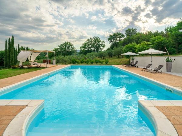 Na zdjęciu widoczny jest obiekt APPARTAMENTI CON PISCINA położony w mieście Morgnano.