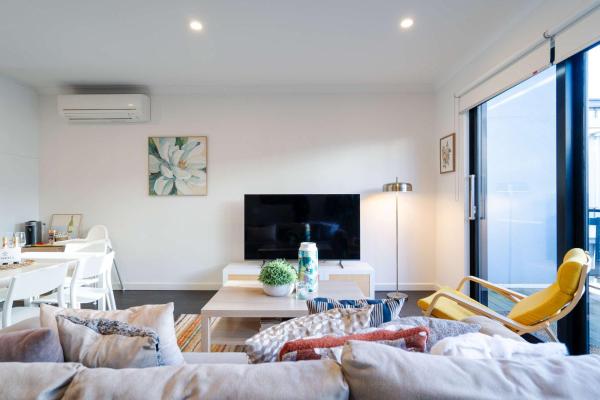 A la foto es mostra l'objecte Bright 3 level townhouse situat a la ciutat de Melbourne.