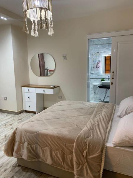 Na fotografii je vidět objekt OZ Stylish Apartment nacházející se ve městě Káhira.