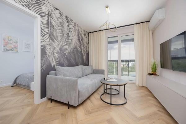 Beige Apartment In Warsaw With Parking And Air Conditioned Living Room By Noclegi Renters - Varsovie