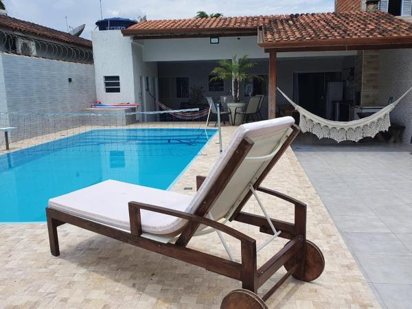 På billedet ses objektet Casa c piscina completa em boraceia beliggende i byen Bertioga.