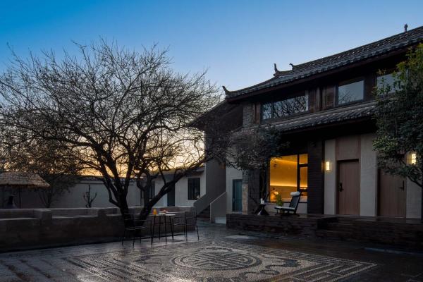 A la foto es mostra l'objecte Shuxia · Summer Lijiang Baisha Snow Mountain Scenic Hotel situat a la ciutat de Baisha.