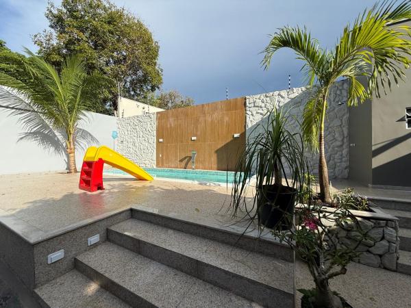 The photo shows the Nossa Casa de férias em Alter do Chão located in the city of Alter do Chao.