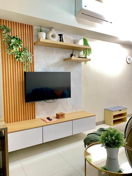A la foto es mostra l'objecte 1BR executive unit in Uptown Parksuites BGC situat a la ciutat de Manila.