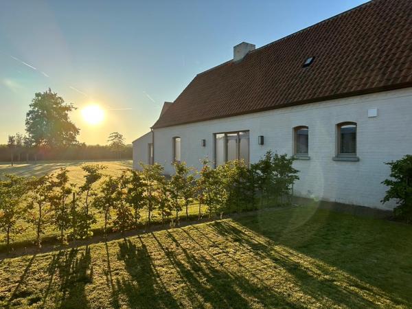 The photo shows the The Farm Cottage located in the city of Waregem.