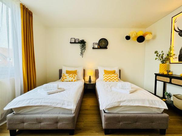 A la foto es mostra l'objecte Black&Yellow Apartment Bielefeld 24h Check in WLAN Parkplatz ÖPNV situat a la ciutat de Werther.