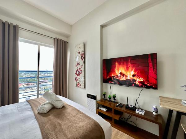 Auf dem Foto ist das Objekt 12F Cozy Studio Unit at The Loop Towers in der Stadt Pontud zu sehen.