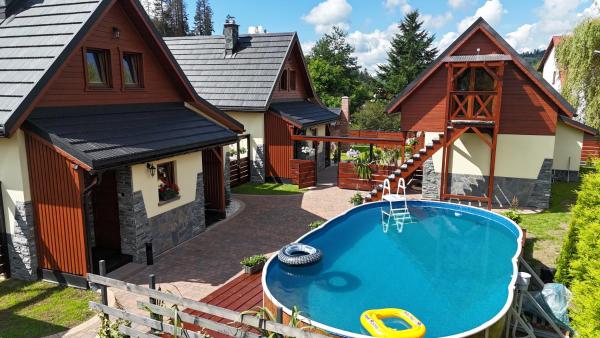 Na fotografii je vidět objekt Osada Złatna domki w beskidach nacházející se ve městě Glinka.