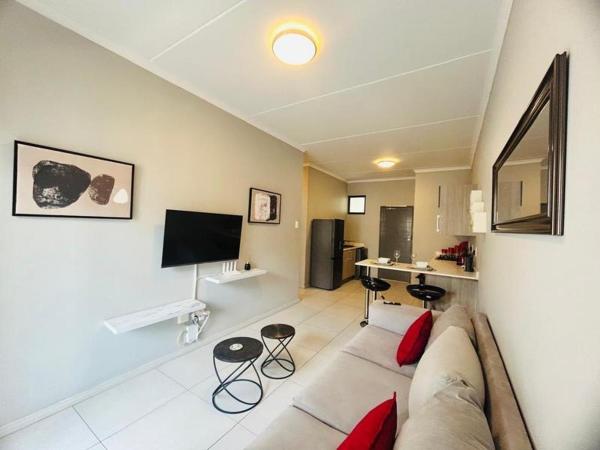 A la foto es mostra l'objecte Mellow-Suites Apartments 130 - WIFI and Netflix situat a la ciutat de Midrand.