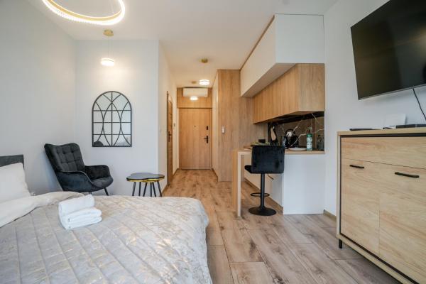 A la foto es mostra l'objecte Global Park 22th View Studio by BookingHost situat a la ciutat de Katowice.