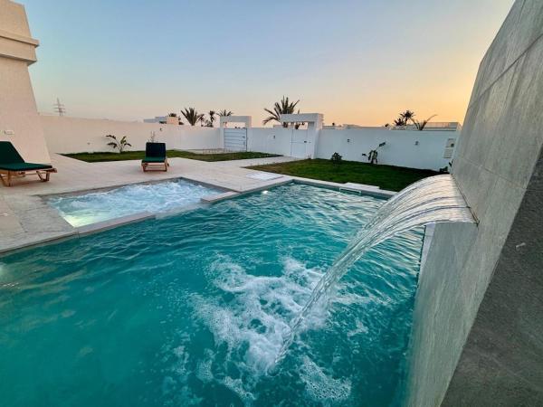 Na zdjęciu widoczny jest obiekt Magnifique Villa Kayo, Djerba położony w mieście Ash Shabābīyah.