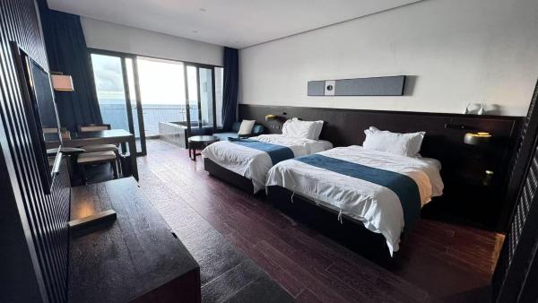 På billedet ses objektet Sandalwood Resort Hotel Apartments beliggende i byen Pinghai.