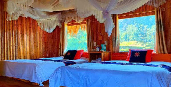 The photo shows the Bình Minh homestay located in the city of Na Lúng.
