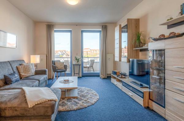 A la foto es mostra l'objecte HafenLiebe mit Blick über den Warener Stadthafen situat a la ciutat de Waren.