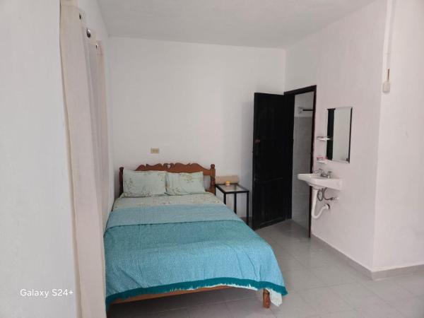 The photo shows the Hotel Maná Calakmul located in the city of Xpujil.