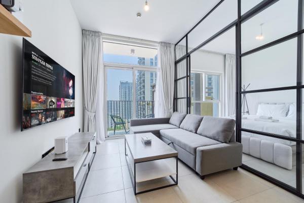 A la foto es mostra l'objecte Modern 1BR Apt in Socio Balcony with Blvd Views situat a la ciutat de Dubai.