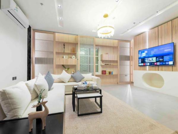 A la foto es mostra l'objecte Luxurious 2-BR flat with relaxation space lll situat a la ciutat de Riad.