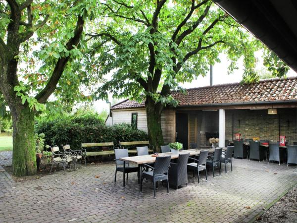 照片显示了位于Asten-Heusden市的Atmospheric country house in Asten on a golf course物件。