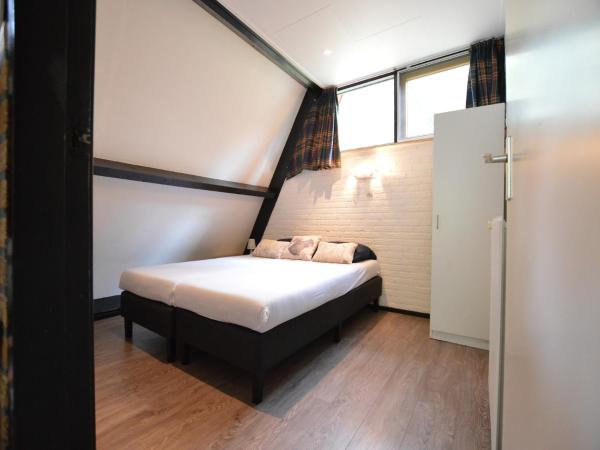 Op de foto is het object Pet-Friendly Getaway te zien, gelegen in de stad Stramproy.
