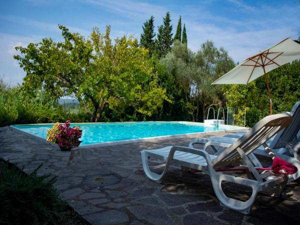 A la foto es mostra l'objecte Apartment with large garden and pool on the hills of Pisa situat a la ciutat de Ghizzano.