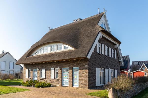 Na foto é possível ver o objeto Haus Ostseestrand localizado na cidade de Lancken.