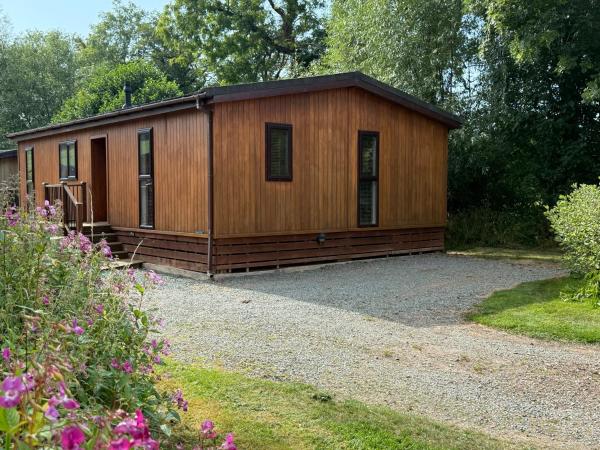 A la foto es mostra l'objecte Luxury Riverside Retreat In Picturesque Setting situat a la ciutat de Clunton.