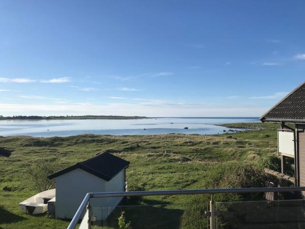 A la foto es mostra l'objecte Bausje Beach , borhaug situat a la ciutat de Farsund.