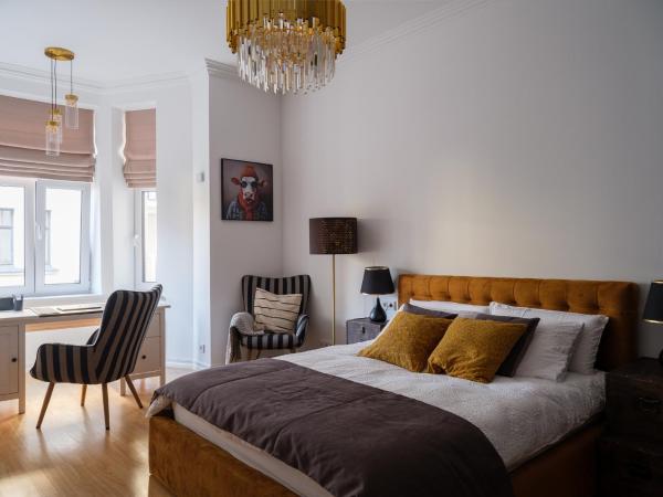 A la foto es mostra l'objecte MIRO Rooms Skolas Exclusive - spacious chic, free parking situat a la ciutat de Riga.