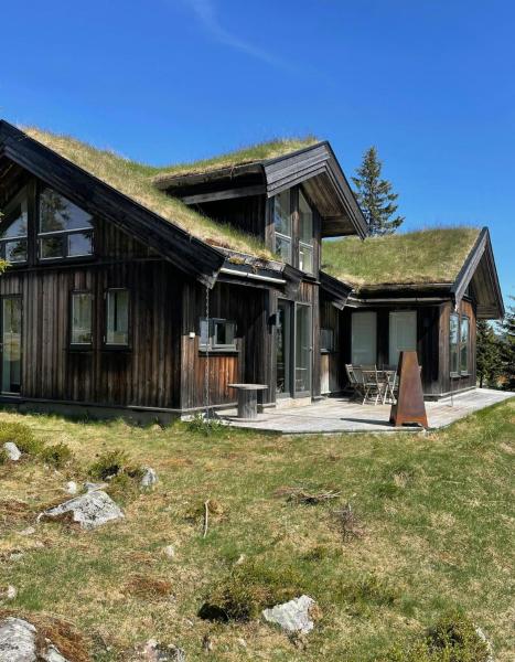 På billedet ses objektet Family Cabin With Sauna At Sjusjøen beliggende i byen Sjusjøen.
