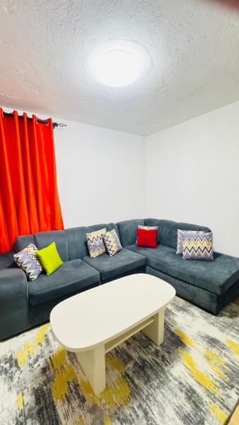 The photo shows the Cozy One bedroom in Ruaka, near two rivers located in the city of Yamogo.