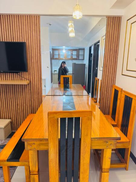 Фотография 6: 2BR with Veranda, Unli Netflix, Wifi