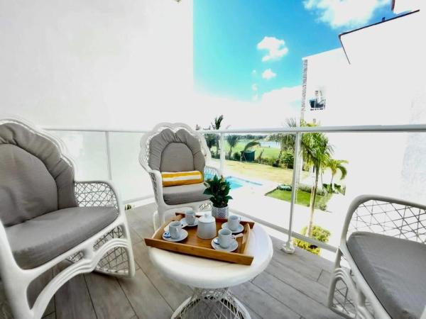 På billedet ses objektet Comfortable 1BDR in Cana Pearl with Lake/Golf View beliggende i byen Punta Cana.