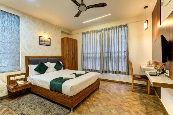 A la foto es mostra l'objecte Emerald Suites By Classio situat a la ciutat de Kormangala.