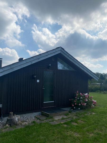 A la foto es mostra l'objecte Cozy Summerhouse situat a la ciutat de Skuldelev.