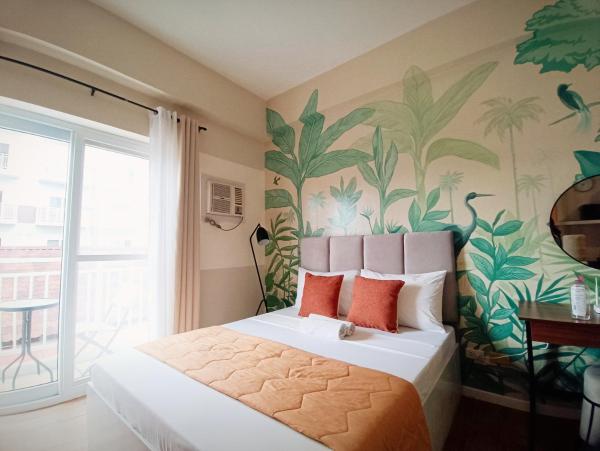 A la foto es mostra l'objecte Studio Condo 3 mins to Mactan Airport with Pool and Gym situat a la ciutat de Pusok.