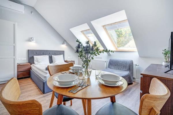 The photo shows the Domillion New modern Vilnius old town studio U2301 located in the city of Vilnius.