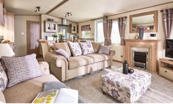 A la foto es mostra l'objecte Seaside Escape Lodge in Newquay ceredigion wales situat a la ciutat de Llanina.