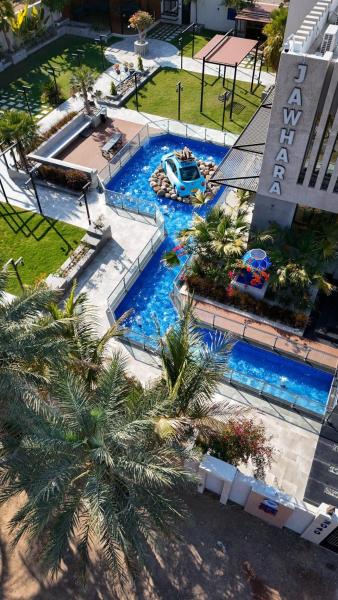 Auf dem Foto ist das Objekt جوهرة الرستاق السياحية in der Stadt Rustāq zu sehen.