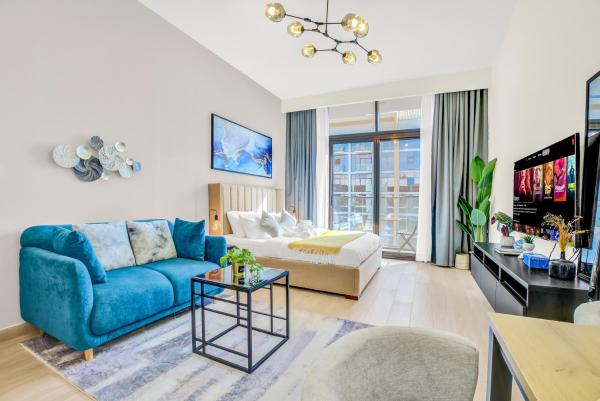 Na zdjęciu widoczny jest obiekt Elegant Studio with Pool Access & Private Terrace położony w mieście Dubaj.