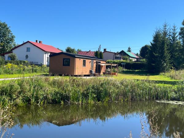 Na zdjęciu widoczny jest obiekt Słoneczny domek na Mazurach położony w mieście Tolejny.