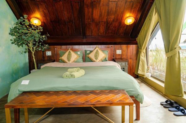 A la foto es mostra l'objecte Mái Rêu Homestay situat a la ciutat de Trai Mat.