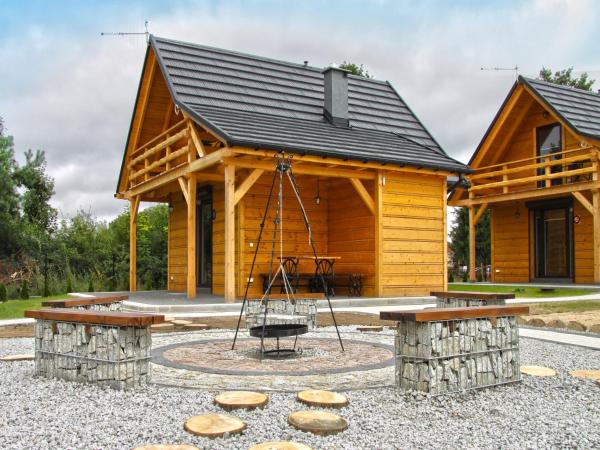 Na zdjęciu widoczny jest obiekt A wooden, eco-friendly house by the Goszcza lake Living room, 2 bedrooms położony w mieście Mostki.