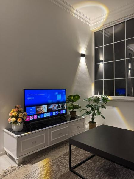 The photo shows the Apple Garden Guba located in the city of İkinci Nügǝdi.