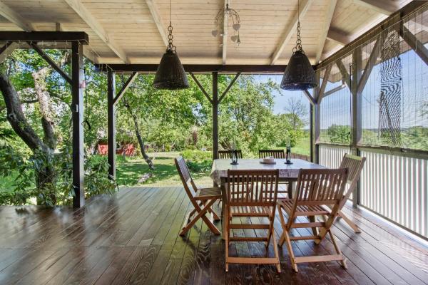 Op de foto is het object Odpocznij Na Werandzie te zien, gelegen in de stad Różan.