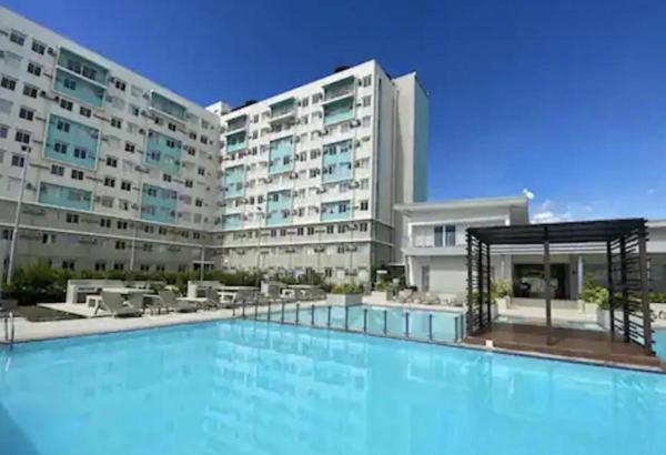 Op de foto is het object DaLei 3-103 Sleeps 8pax at Marina Spatial Condominium in Dumaguete City te zien, gelegen in de stad Dumaguete.