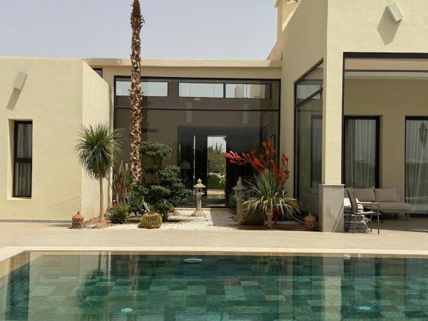 Na foto é possível ver o objeto Luxury Villa Pool with Atlas View localizado na cidade de Moussiha.