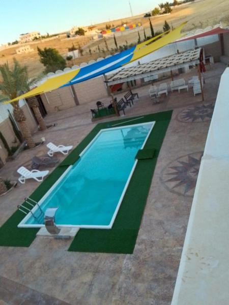A la foto es mostra l'objecte شاليه هاف مليون الرامة situat a la ciutat de Al Mazār.