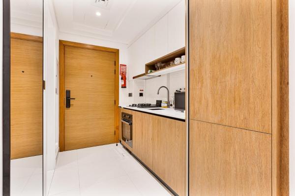 Foto 4: Elegant Studio with Pool & Gym, Near Metro Station