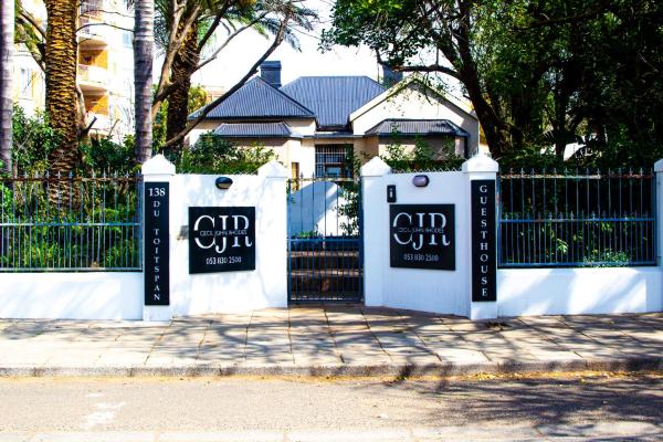The photo shows the Cecil John Rhodes Guest house located in the city of Beaconsfield.