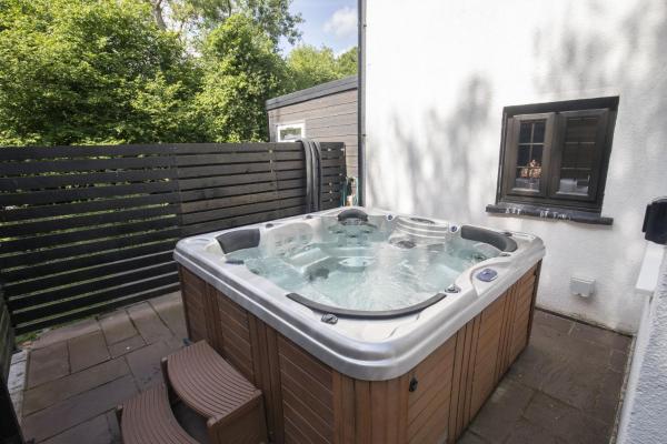 A la foto es mostra l'objecte Tranquil Cottage with Hot Tub situat a la ciutat de Llancillo.